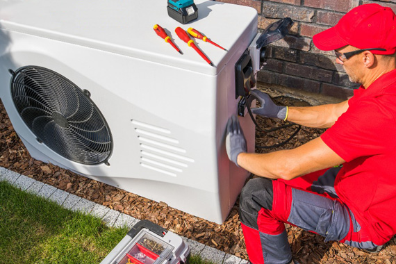 Done Right technician servicing an air conditioner